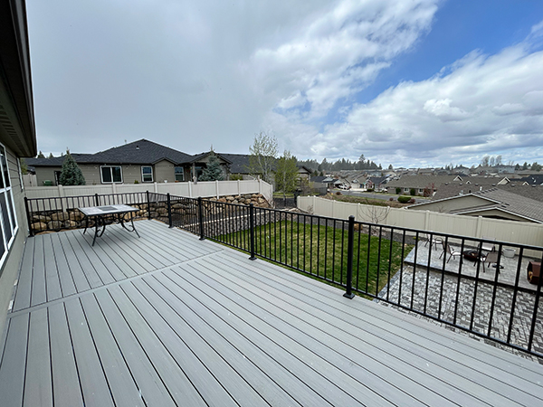 An elevated deck overlooking the suburbs.
