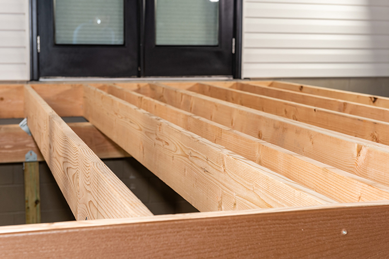 Framed deck using Doug fir lumber as an alternative material.