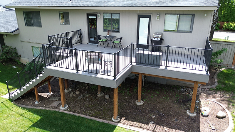 Custom second-story deck with a bump-out design, adding extra space and functionality to the outdoor area.