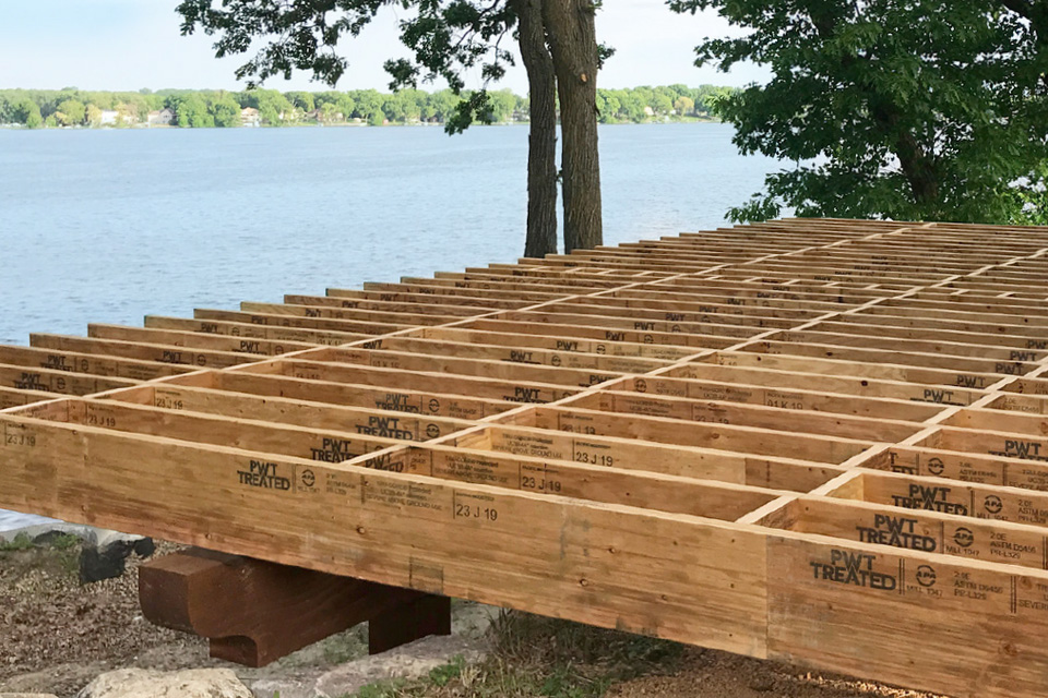 Deck framing with LVL treated joists showcasing strength and durability.